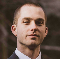 加密貨幣市場專家 Thomas Whitfield 的交易分析師個人照